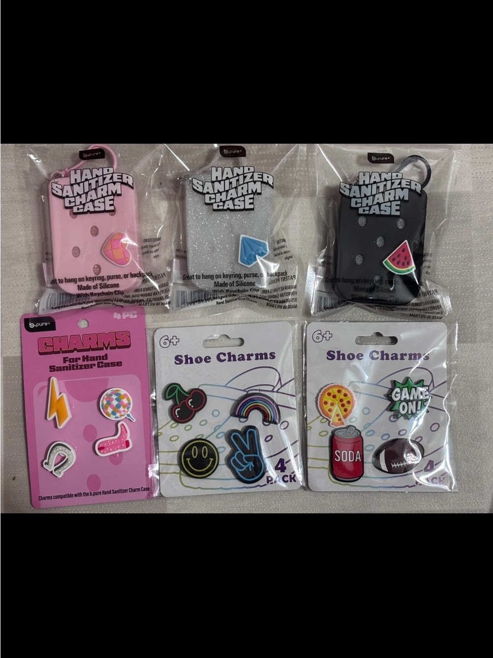 B.Pure Hand Sanitizer Charm Cases in Pink, Glitter, Black